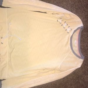 Maurice’s light yellow sweatshirt. Only wore twice